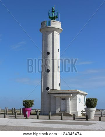 CAYEUX-SUR-MER, FRANCE, MARCH 29 2016: Hourdel Lighthouse (Phare du Hourdel), situated on the point of Hourdel on the south side of the bay of the Somme in Northern France.