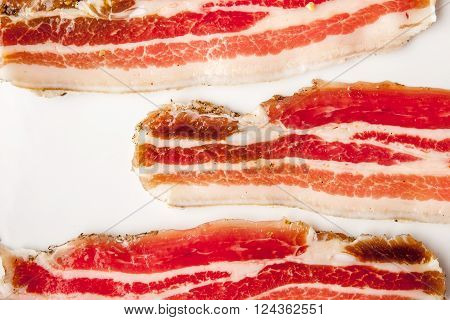 Streaky bacon on the white background horizontal