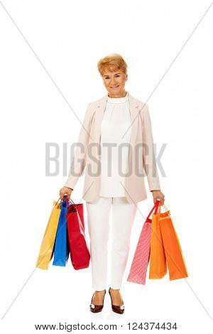 Happy business woman holging shopping bags