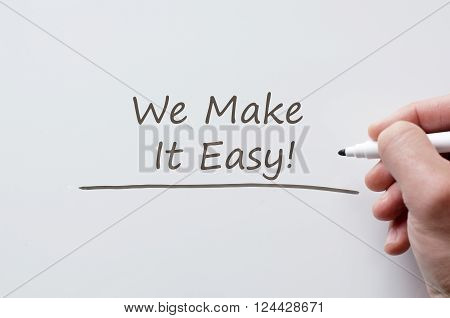 Human hand writing we make it easy on whiteboard