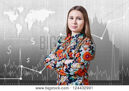 Young woman standing on the traiding graph background. Elements of this image furnished by NASA