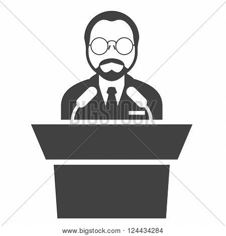 Speaker at rostrum - man in glasses at tribune presentation