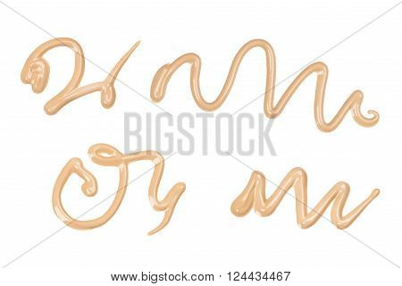 Close-up foundation cream sample on white background