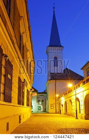 KOSICE, SLOVAKIA - MARCH 20, 2016: Church and historic architecture in the centre of Kosice city in eastern Slovakia on March 20, 2016.