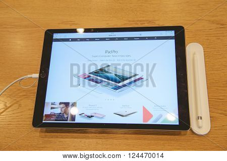 PARIS FRANCE - APR 4 2016: Apple pencil on the biggest Apple iPAd Pro during the sales launch of the latest Apple Inc. smartphone and iPad Pro at the Apple store in Paris France