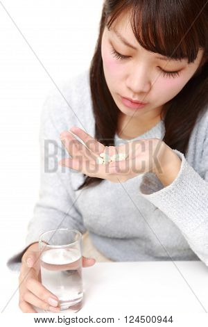 portrait of young Japanese woman suffers from melancholy