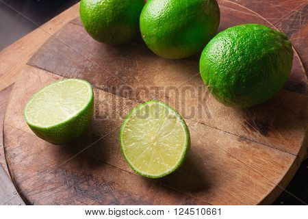 Brazilian Taiti Lemon over a wooden table