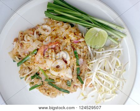 Thai Style Noodles. Thailand's National Dishes, Stir-fried Rice Noodles With Shrimp And Squid (pad T