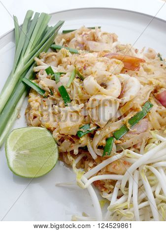 Thai Style Noodles. Thailand's National Dishes, Stir-fried Rice Noodles With Shrimp And Squid (pad T