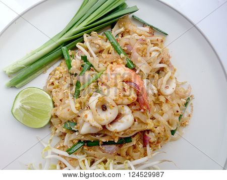 Thai Style Noodles. Thailand's National Dishes, Stir-fried Rice Noodles With Shrimp And Squid (pad T