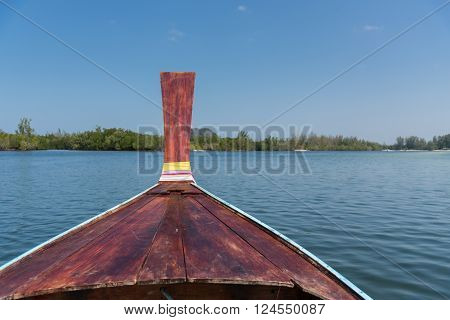 Thai Wooden Head Longtail Boat Heads Toward