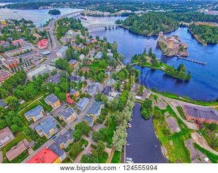 Aerial view of Olavinlinna Olofsborg Medieval 15th century Castle and Savonlinna town in Finland.