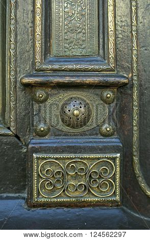 Detail part of decorative old wooden door with ornament in Tbilisi Georgia