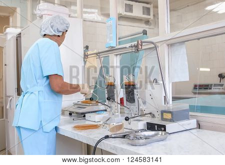 The process of monitoring the quality of the blood. Instrumental laboratory manipulations