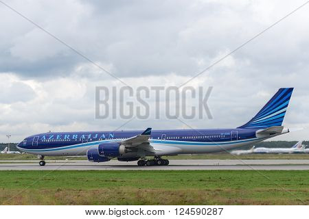 DOMODEDOVO RUSSIA - JULY 20: Azerbaijan Airlines Airbus A340 taxiing at Moscow airport in Domodedovo on July 20 2013. Azerbaijan Airlines is the national carrier of Azerbaijan.