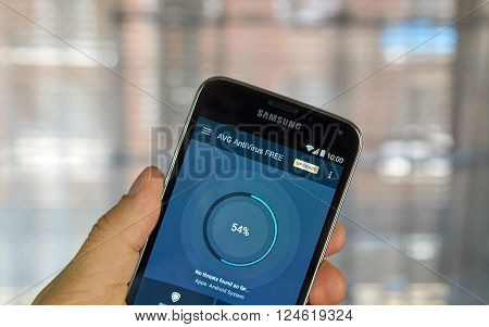 MONTREAL CANADA - APRIL 5 2016 : AVG antivirus on Android cell phone. AVG is one of the popular antivirus PC and mobile software.
