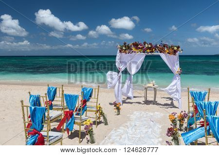decorated wedding arch  on Puka beach at Boracay island Philippines

