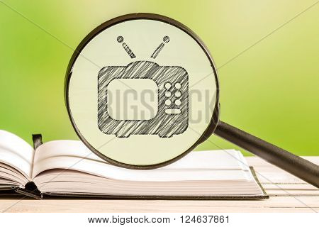 Tv Guide With A Pencil Drawing