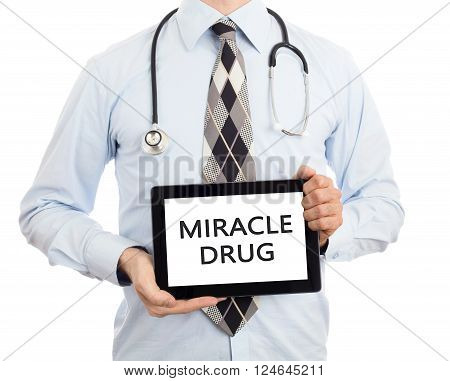 Doctor Holding Tablet - Miracle Drug