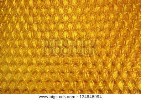 Amber Bubble Wrap Packing Or Air Cushion Film Abstract Background
