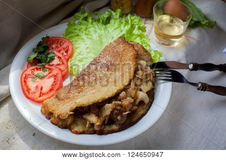 Hot Dranik with meat and vegatables on the plate