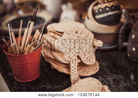tool in pottery. Detail from pottery work room - brushes and tools