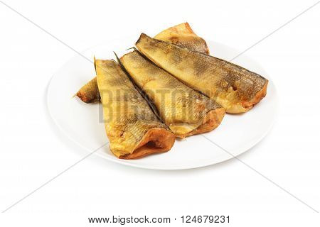 Cold smoked notothenia on plate isolated on a white background