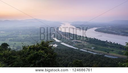Aerial landscape view of Mekong river with mountain ranges at twilight in Nong Khai Province, Thailand