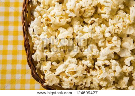 Freshly made popcorn on a table. Pipoca.