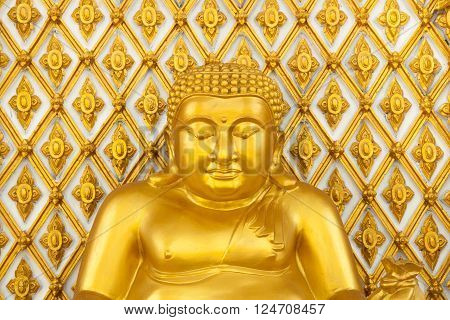 Golden fat buddha statue in thai temple