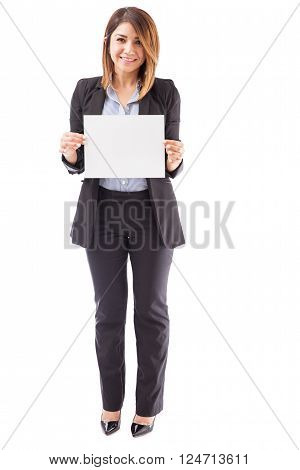 Pretty Businesswoman Holding Up A Sign
