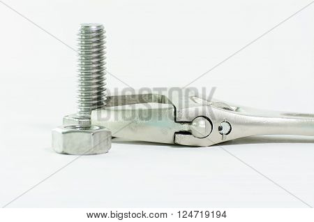 Wrench & hex bolt & hex nut on a white background.