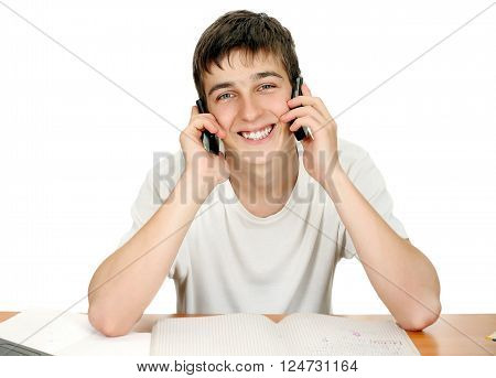 Cheerful Young Man with Two Mobile Phones Isolated on the White Background