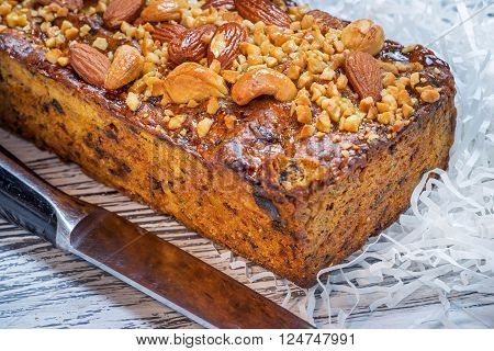 Nuts and honey cake on a wooden table
** Note: Shallow depth of field