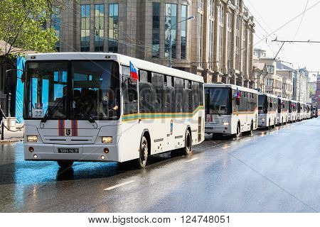 MOSCOW, RUSSIA - MAY 6, 2012: Line of the Emercom buses NefAZ 5299 in the city street.