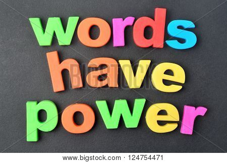 Colorful letters words have power on black background