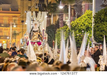 San Fernando, Spain - March 31, 2015: Holy Week in San Fernando Cadiz Spain. Brotherhood of charity during the procession of Easter.