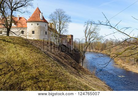 Old medieval castle near river in Bauska town, Latvia