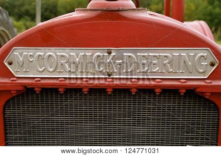 ROLLAG, MINNESOTA, September 10, 2016: A McCormick Deering grill of a restored tractor is displayed at the West Central Steam Threshers Reunion(WCSTR) where 1000's attend each Labor Day weekend in Rollag, MN each year.