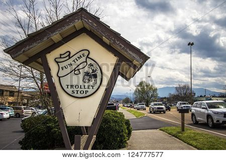 Pigeon Forge, Tennessee, USA - March 26, 2016 - Trolley stop allows visitors to travel between Gatlinburg and Pigeon Forge. The two resort towns receive approximately 12 million visitors annually