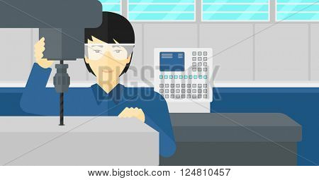 Man working with boring mill.