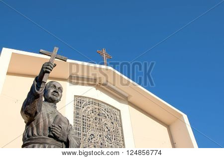 San Gabriel California USA./April 3 2016: Photo of Mission San Gabriel Arcangel with statue of Junipero Serra