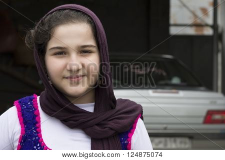 Portrait of Teenage Beautiful Girl Wearing Traditional Knitted Cloth with Shawl And Posed for Camera