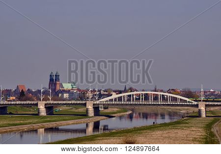 Bridge on the River Warta and the towers of the cathedral in Poznan