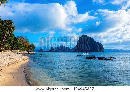 Beautiful landscape with palms, beach and sea El-nido, Palawan, Philippines