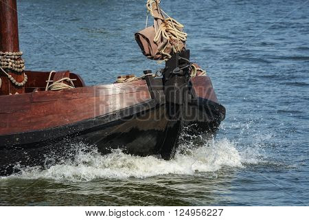 prow cutting through the water near Amsterdam