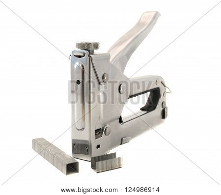 The chromeplated construction stapler on a white background