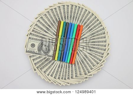 dollar banknotes on a vessel as a complete fan rings in the middle markers