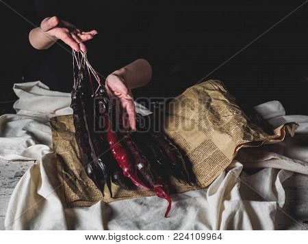 cropped shot of woman holding traditional geoogian desserts churchchel