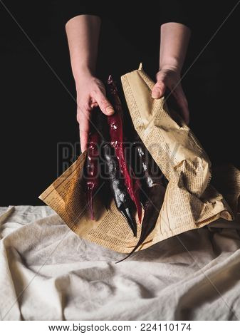 cropped shot of woman holding traditional geoogian desserts churchchel